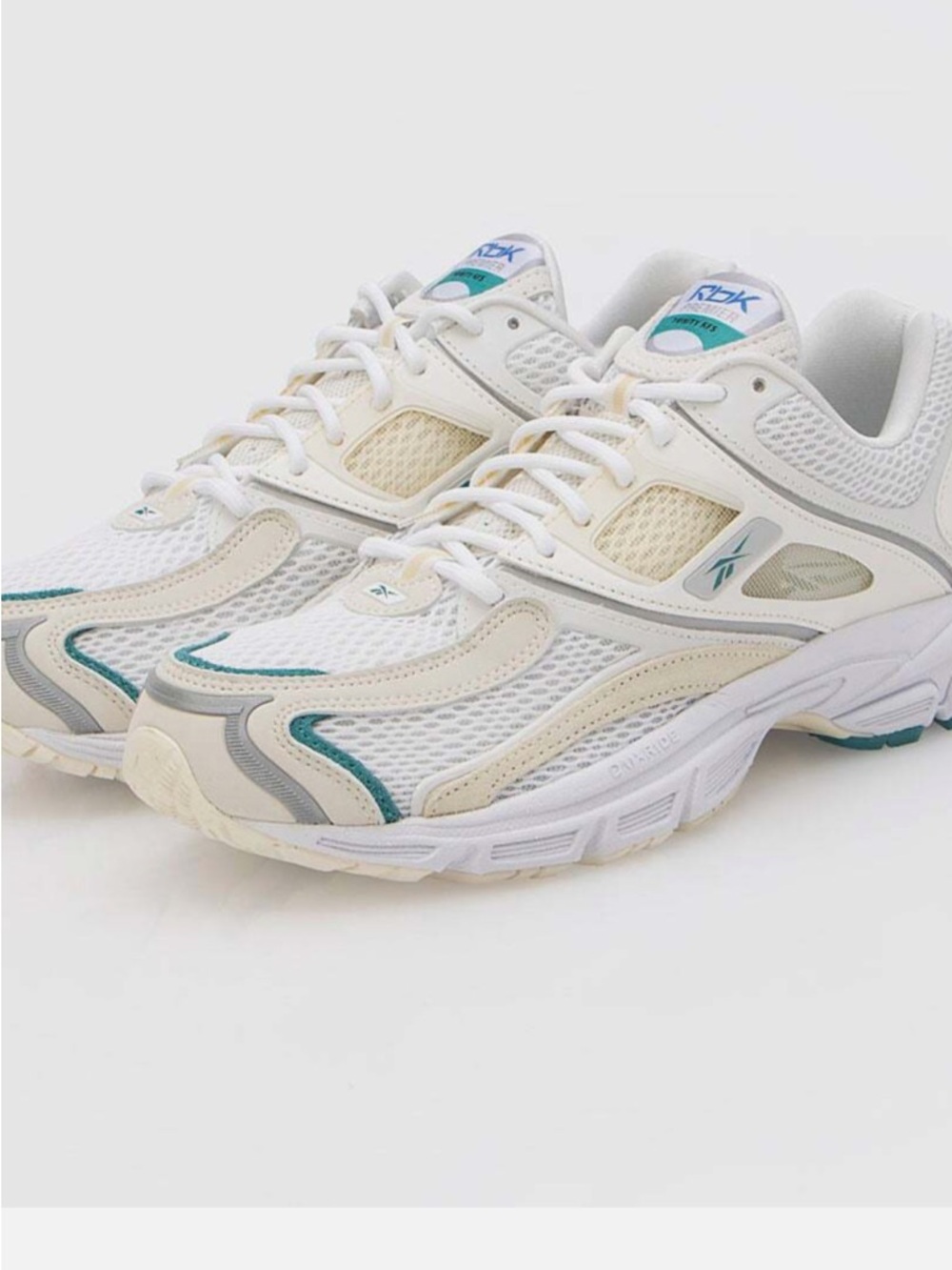 Reebok Men’s White, Teal and Cream Running Sneakers